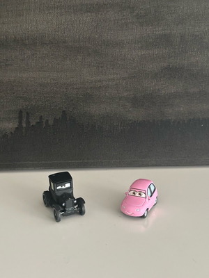 Disney Cars set of 2 toy cars like new (black & pink)