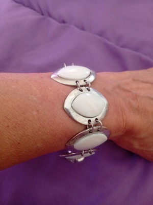 Statement bracelet made of stainless steel like new with white resin stones