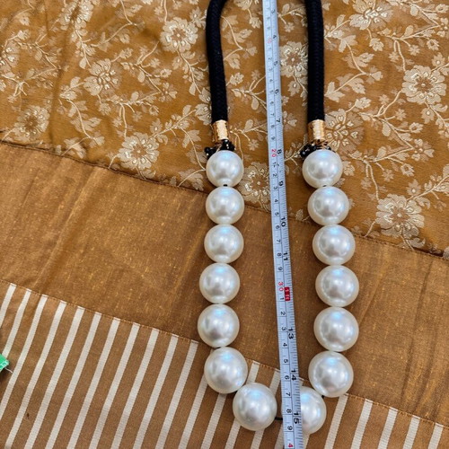 Pendant like new with large black and white beads