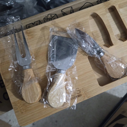 Cheese cutting set new with cutting board and knives