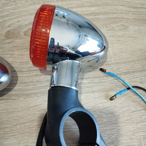 Motorcycle turn signals new with chrome base and orange cover