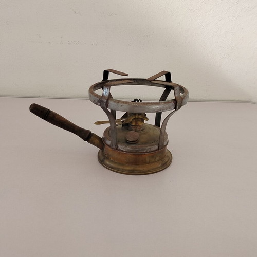 Pitsos Freres brass gas stove used with wooden handle