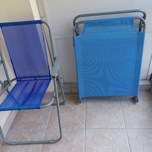 New beach lounger with used chair