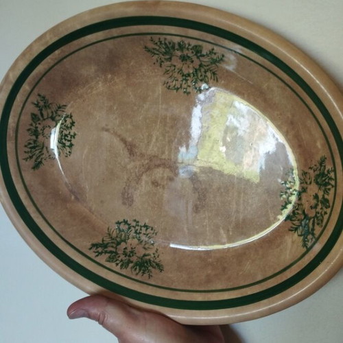 Handmade beige platter with green used, aged wear