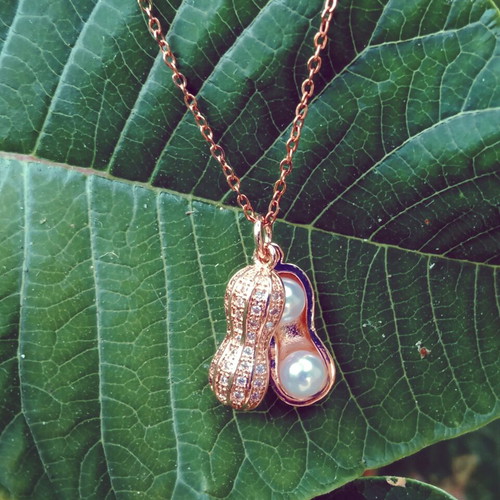 Peanut necklace with rhinestones and pearls, new