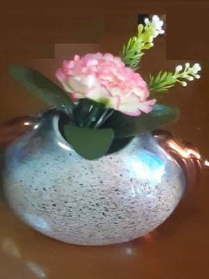 Vintage ceramic vase with duck head handles and decorative flower