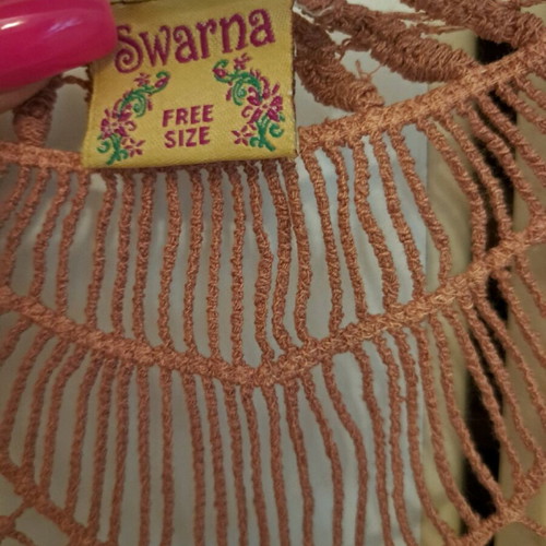 Caftan used with impressive knitted back