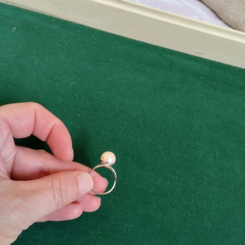 Ring with white stone in silver color like new