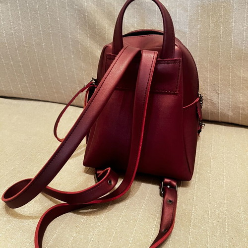 FRNC Backpack like new, burgundy with fringes and detachable wallet