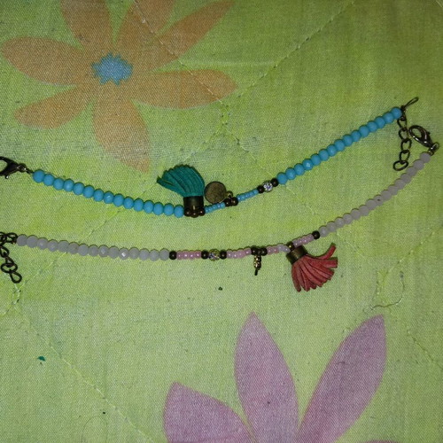 Beaded bracelets used, set of two, blue and pink