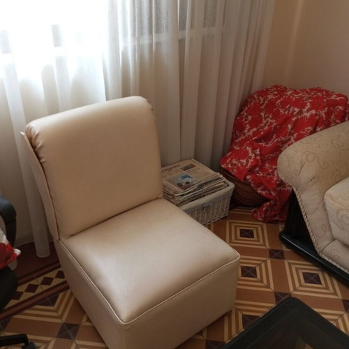 2 sofas with a free armchair