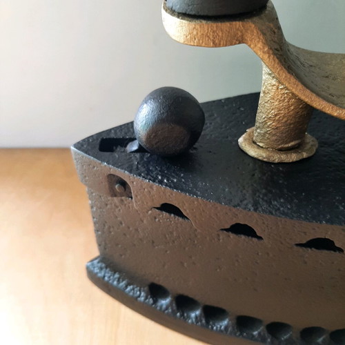 Charcoal iron used from 1920-30 with thorough restoration