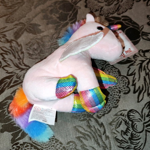 Plush unicorn sitting pink with colorful wings mane and tail new