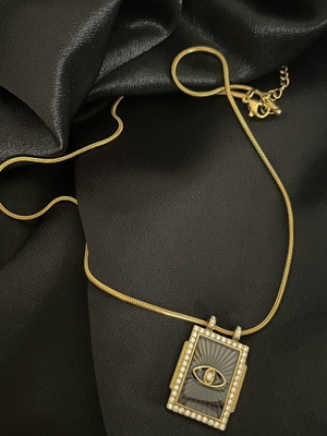 Necklace new, gold tone with eye symbol pendant and zircon