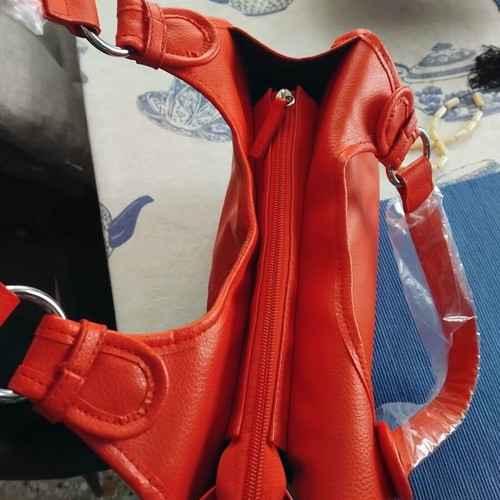 Red leather handbag new without defects