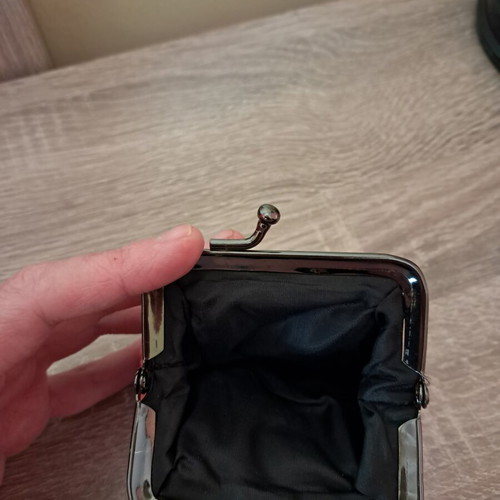 Wallet used, coral color, for coins or other use