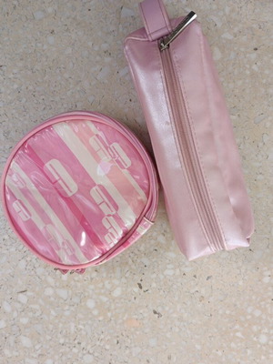 Clinique toiletry bag set used, pink, round and rectangular