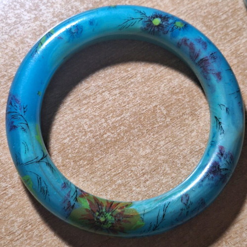 Petrol resin bracelet with flower designs like new