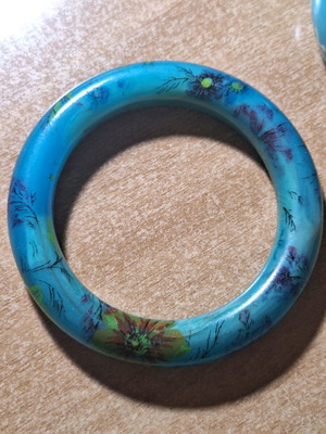 Petrol resin bracelet with flower designs like new