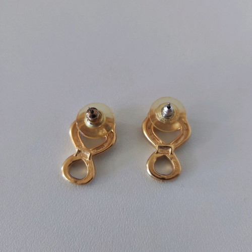 Gold infinity-shaped earrings like new