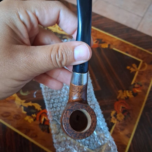 Vintage briar tobacco pipe with metal ring