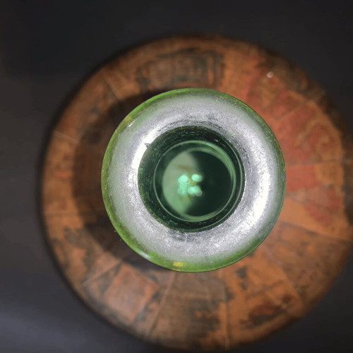Vintage wine bottle used with Old World map design