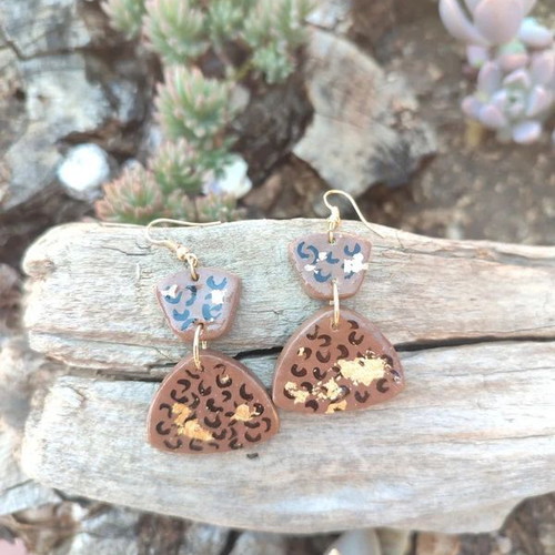 Clay earrings new with painted animal print and gold leaf accents