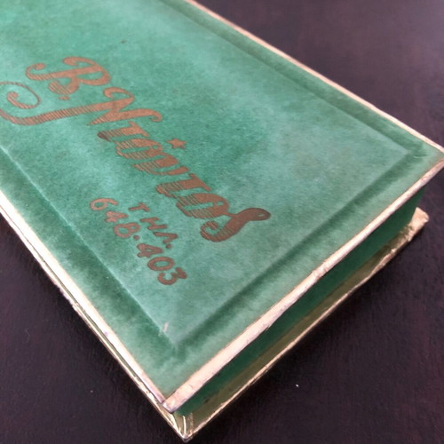 Old box used with B. Ntondos logo made of paper and velvet