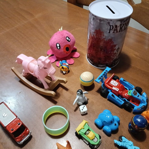 Various toys with piggy bank used