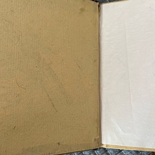 Photo album used with recycled paper, wood and natural leaf