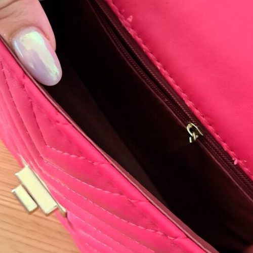 Red shoulder bag like new with gold chain strap