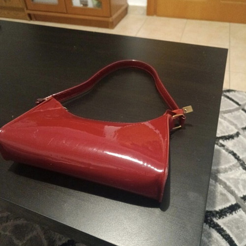 Red shoulder bag used, suitable for evening walk