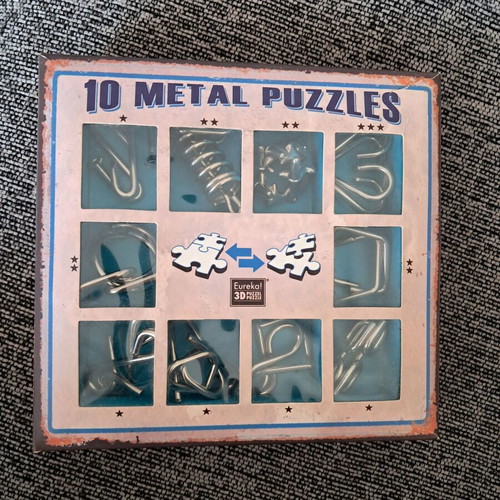 Metal puzzle set like new, pack of 10