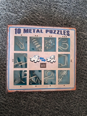 Metal puzzle set like new, pack of 10