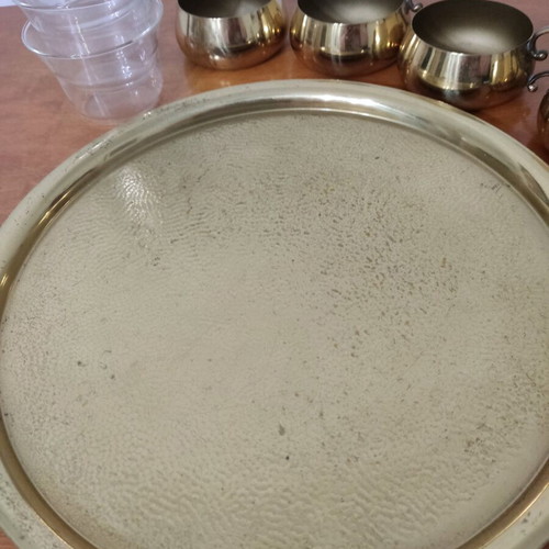 Bronze tea cups with glass on tray used