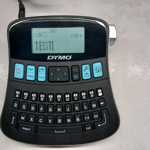 Dymo 210D label maker like new with power adapter and Greek support