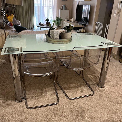 Glass kitchen table with four chairs like new