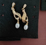 Gold-tone hand earrings with pearls and rhinestones