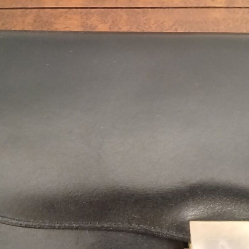 Envelope bag black genuine leather 14x28 cm used with plastic paint stain