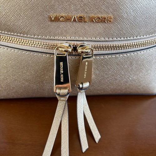 Michael Kors Rhea Medium backpack like new, gold
