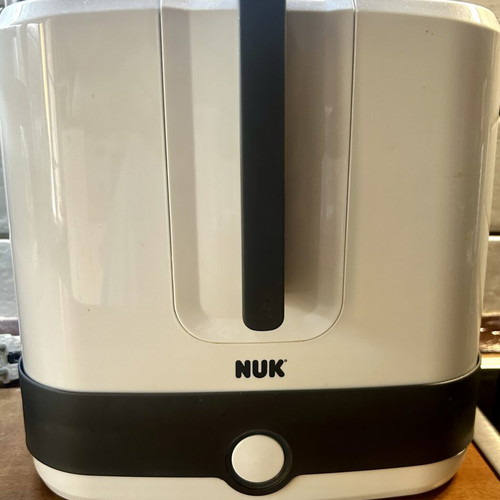 NUK Sterilizer like new, steam disinfects baby utensils