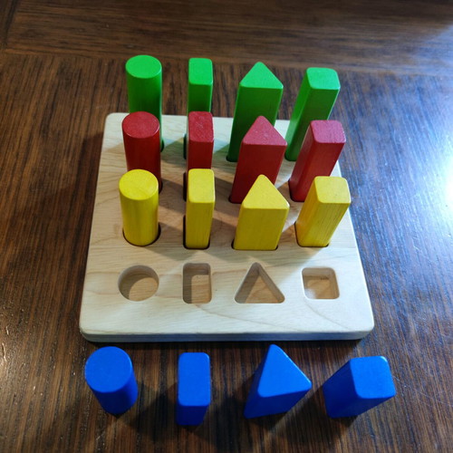 Plan Toys Wooden Shape Sorting Game like new for 24+ months