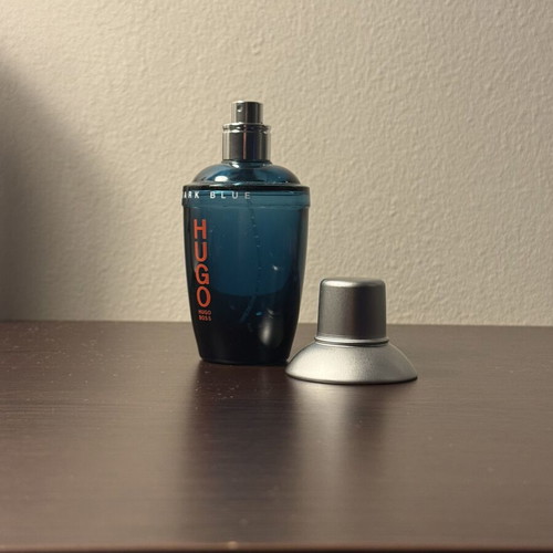 Hugo Boss Dark Blue cologne bottle used, empty glass