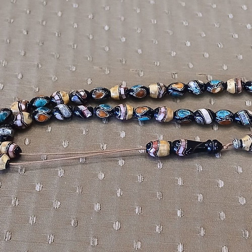 Yiousouri Worry Beads used with amber, mother-of-pearl and silver embroidery