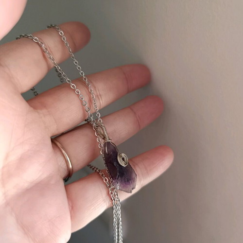 Amethyst wire-wrapped pendant on steel chain