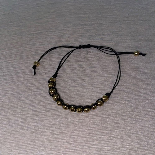 Handmade bracelet with gold details