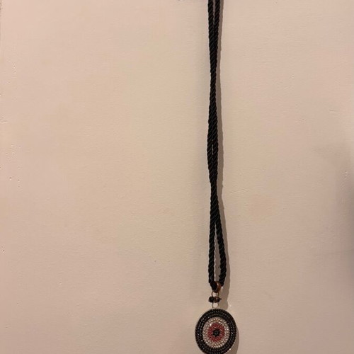 Long necklace with eye and tassel used, silver black and burgundy rhinestones