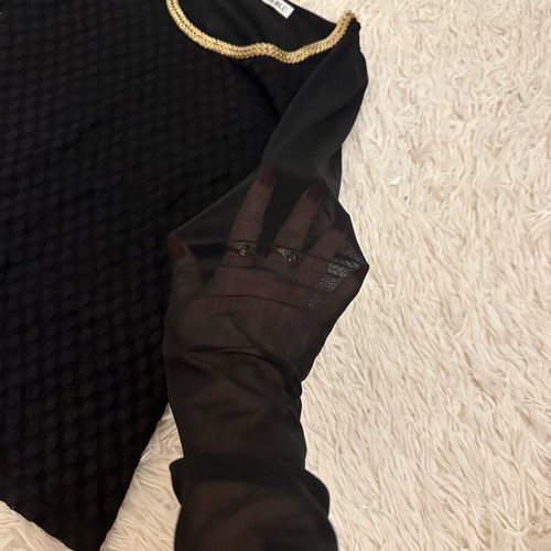 Black blouse used with gold metallic design and mesh sleeves