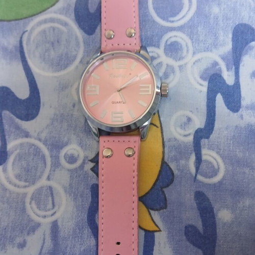 Fashion pink watch with silver used, slight wear