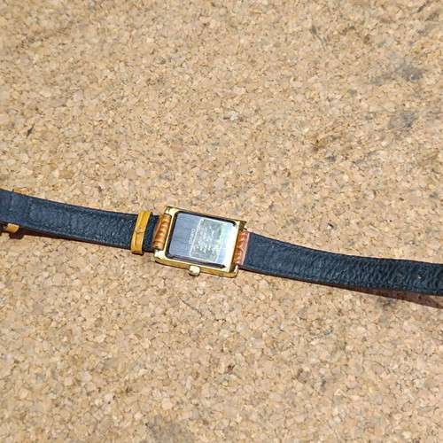 Casio women's watch used with brown leather strap